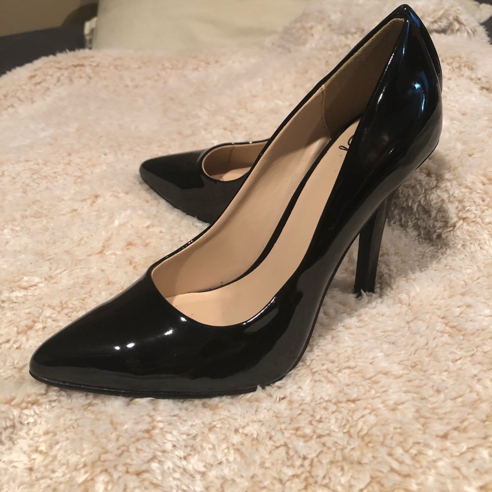 Black pointed toe heels